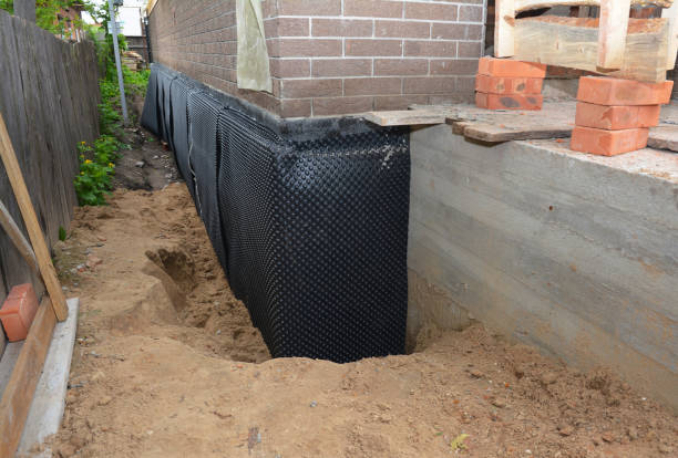Happy homeowners after waterproofing job in Bloomington Springs